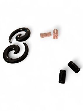 Black Spiral Ear Stretchers with Sparkle Pink And Black Plugs